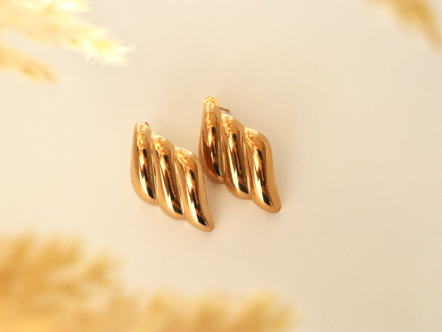 Croissant gold studs